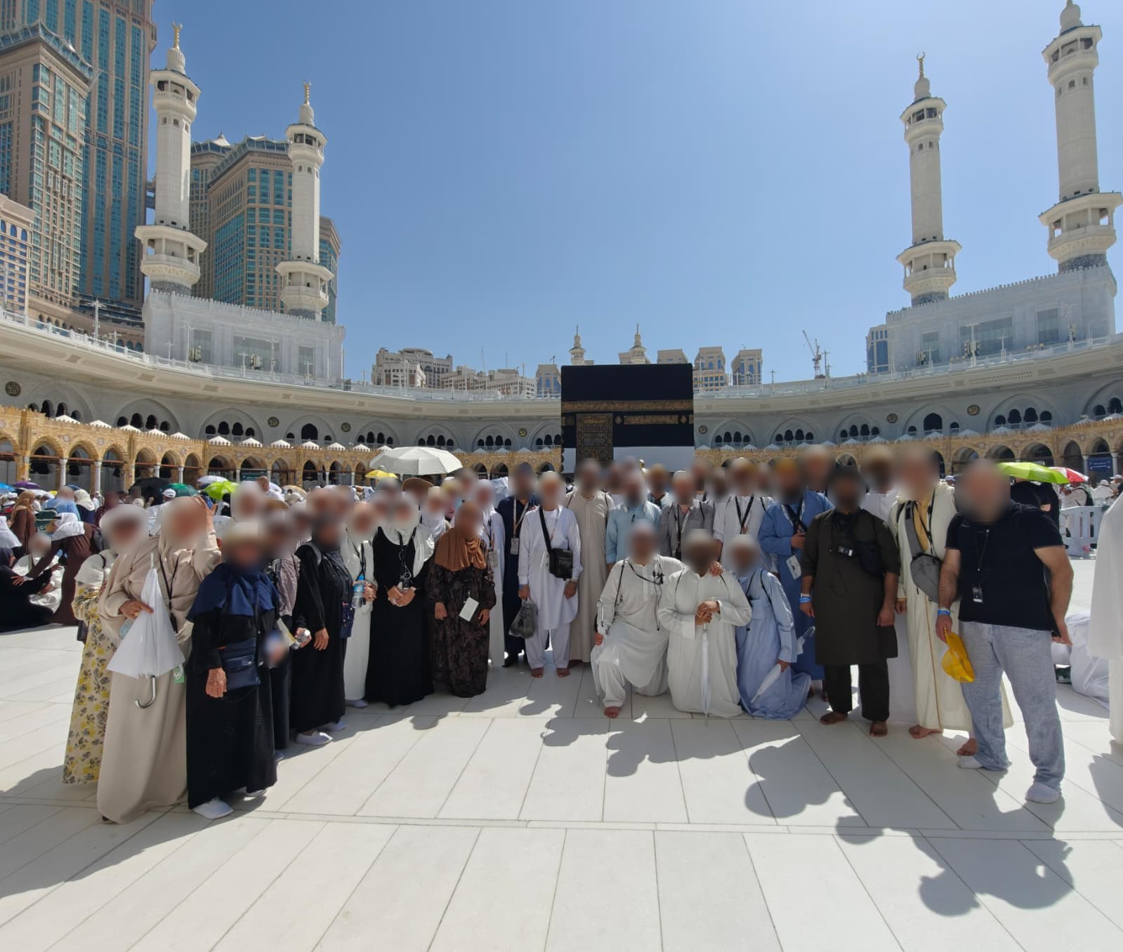 Our group together in front of the Kaaba