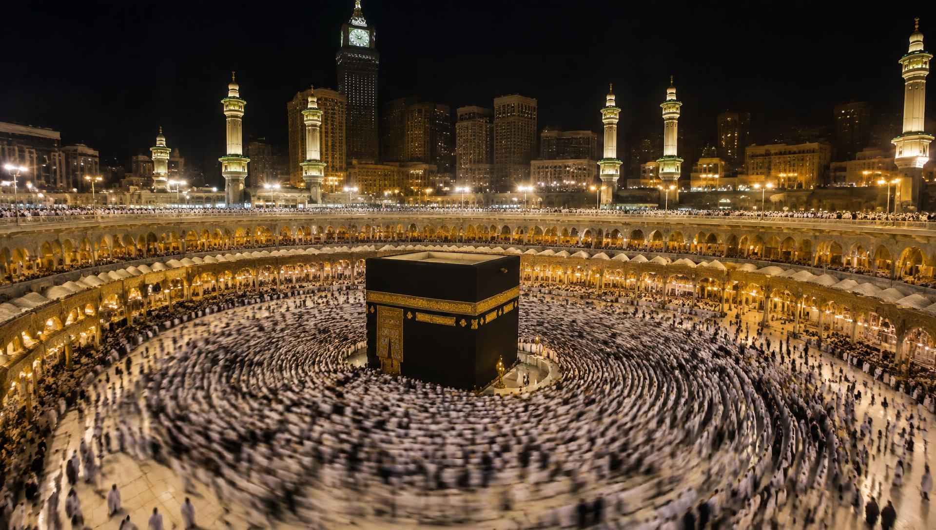 Pilgrims performing tawaf around the Kaaba at night